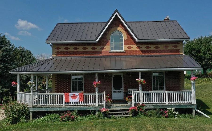 All-Star Metals Standing Seam Roofing Installed On House - Image courtesy of https://www.all-starmetals.com/