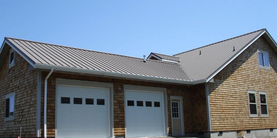 Bruce & Dana Wholesale, Inc. Brown Standing Seam Roof Installed - Image courtesy of https://bruceanddanainc.com/