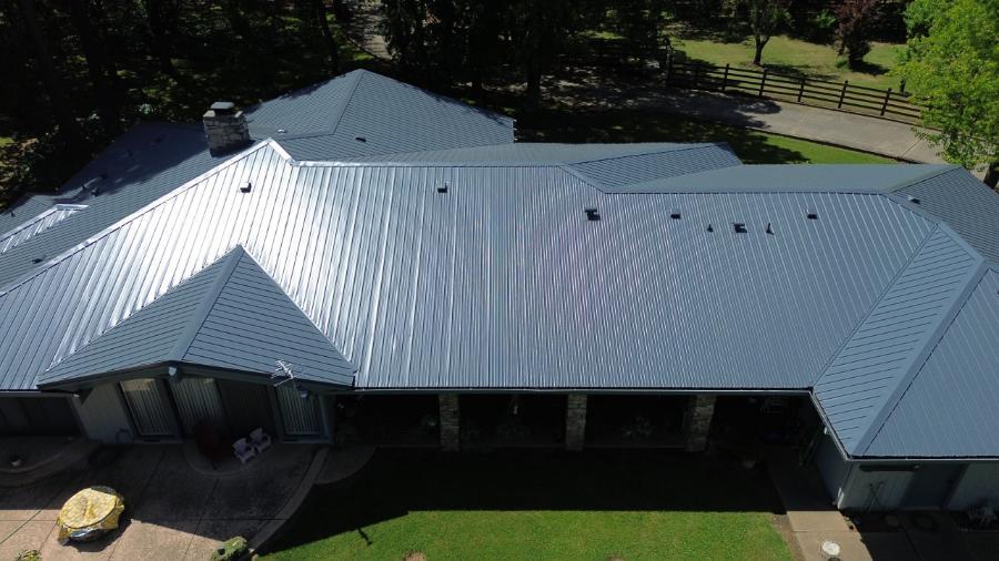 California Steel Exposed Fastener Roof Installed - Image courtesy of https://californiasteelroofing.com/
