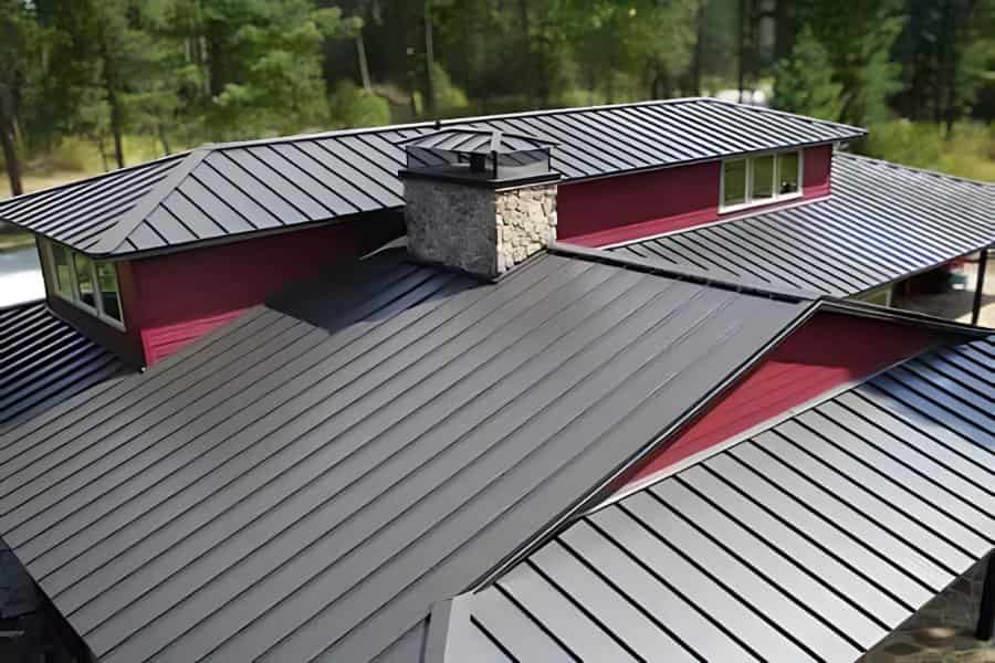Custom Built Metals standing seam roof on house - Image courtesy of https://www.custombiltmetals.com/
