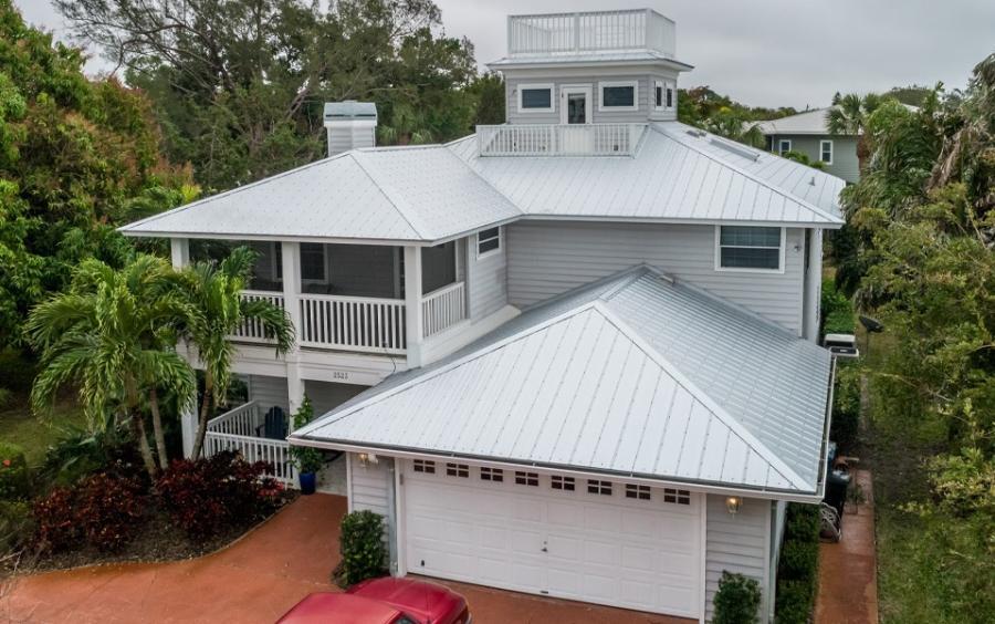Gulf Coast Supply & Manufacturing Exposed Fastener Roof Installed - Image courtesy of https://gulfcoastsupply.com/