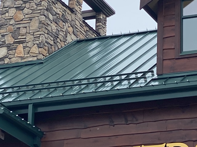 Another example of bad snow rail layout on a metal roof