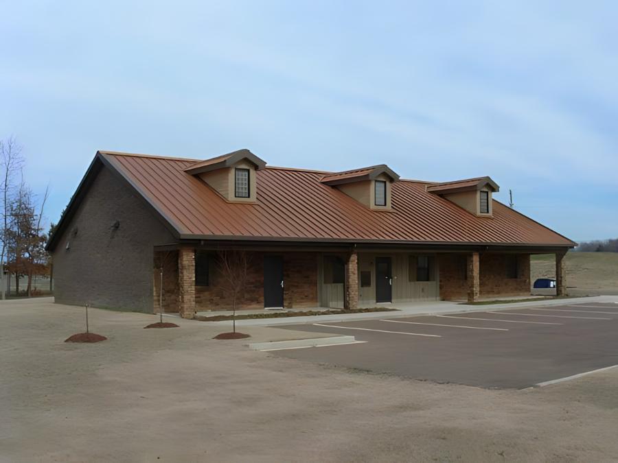  Inland Building Systems standing seam roof installed - Image courtesy of https://inlandbuildings.com/