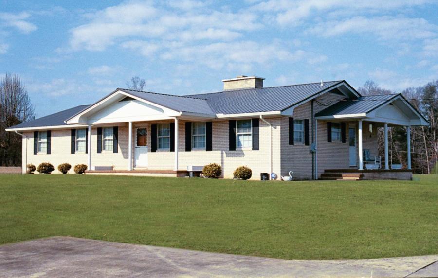 JD Metals exposed fastener roof installed on home - Image courtesy of https://www.jd-metals.com/