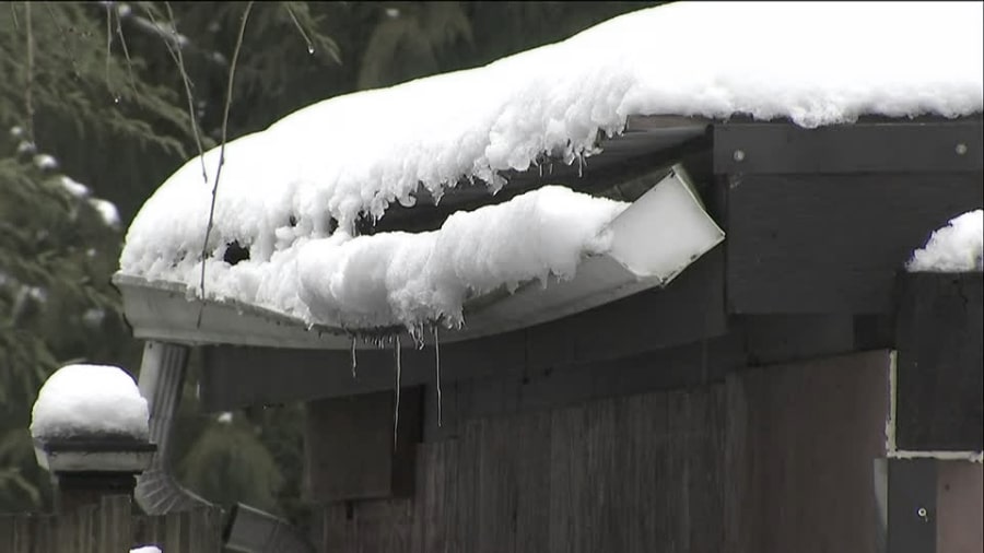 Snow and Ice Weight Ripping Gutter From Building - Image Courtesy of Kiro7.com