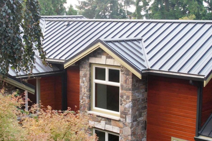 Nu-Ray Metals standing seam installed on residence - Image courtesy of https://www.nuraymetals.com/