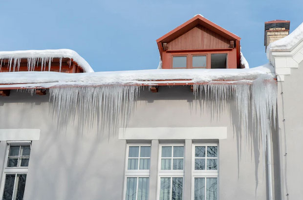 Image showing icicles hanging from the edge of a roof