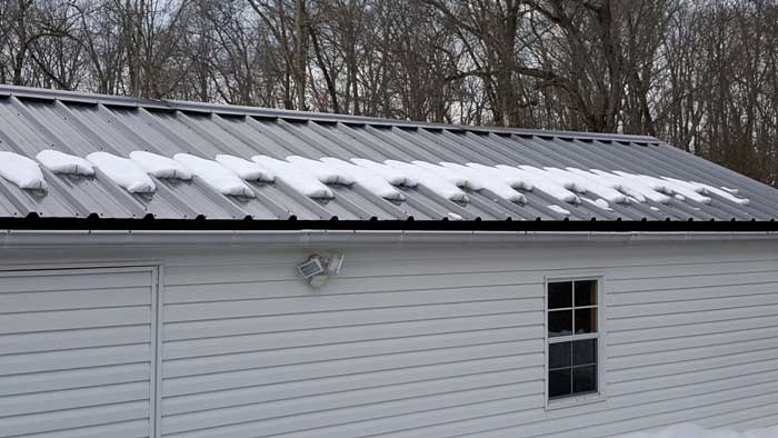 Snow Guards Shown on a Metal Roof