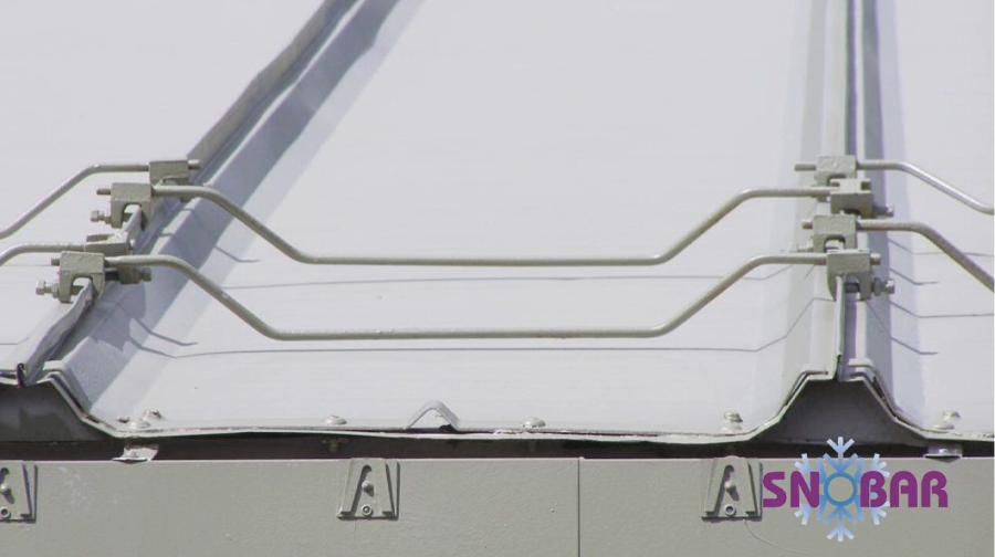 Closeup of the Snow Retention System Mounted on a Butler MR-24 Roof in Inverness Colorado