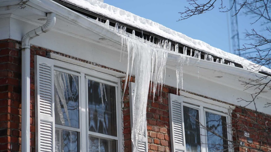 Gutter Damaged Caused By Ice Dams - (Image Courtesy of TodaysHomeowner.com)