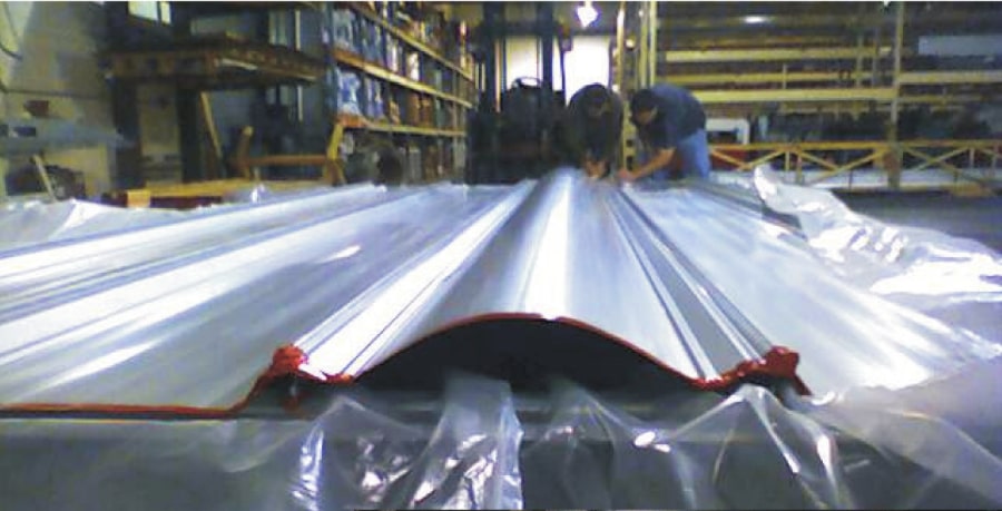 Image showing an example of a metal roof panel bowing